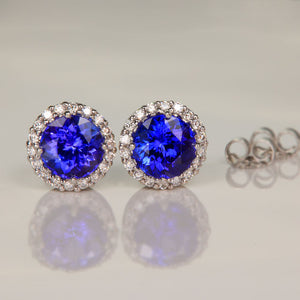 Tanzanite earrings with diamond halo in 14k white gold