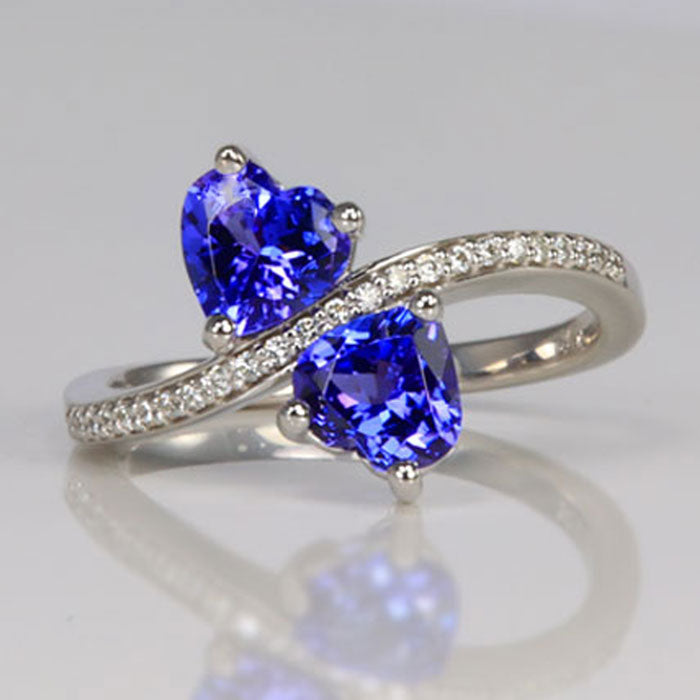 white gold and tanzanite heart ring with diamonds