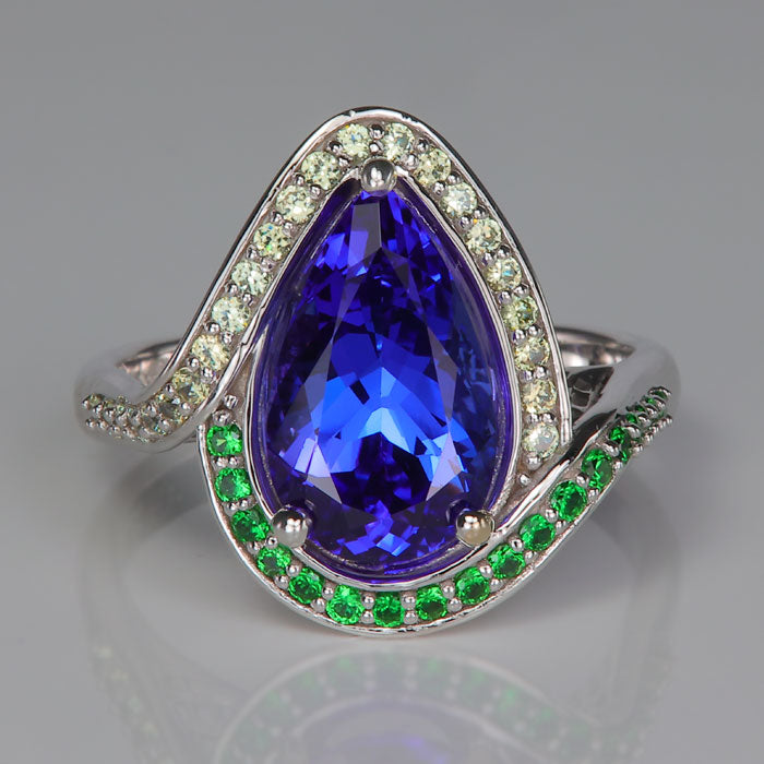 blue violet tanzanite tsavorite and demantoid garnet gemstone ring 
