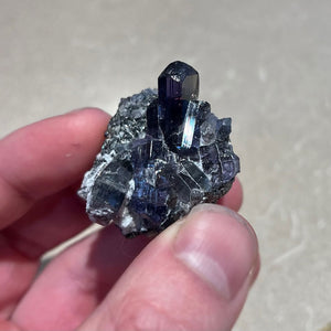 Natural unheated tanzanite crystal specien on host rock