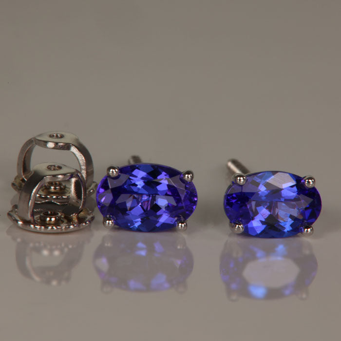 Oval tanzanite stud earrings 14k white gold