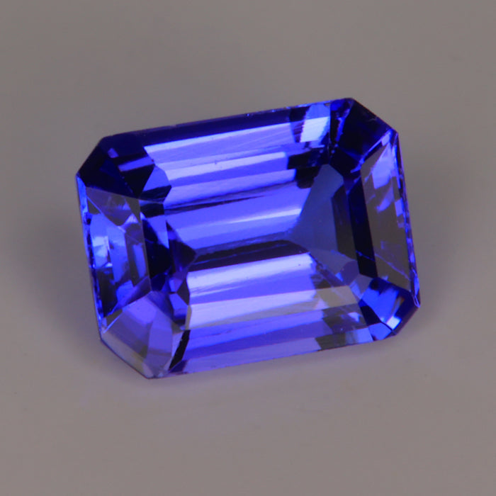 blue violet emerald cut tanzanite gemstone