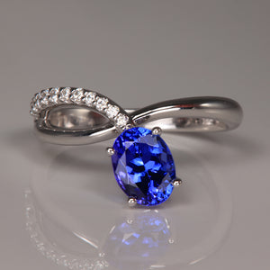 Oval Blue Tanznite in 14k white gold ring and diamonds