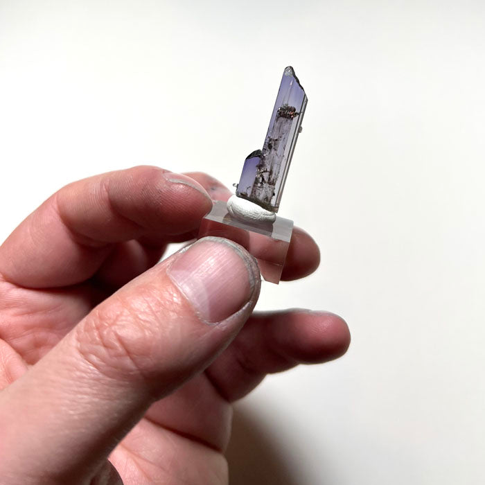 raw tanzanite crystal with secondary crystal growth