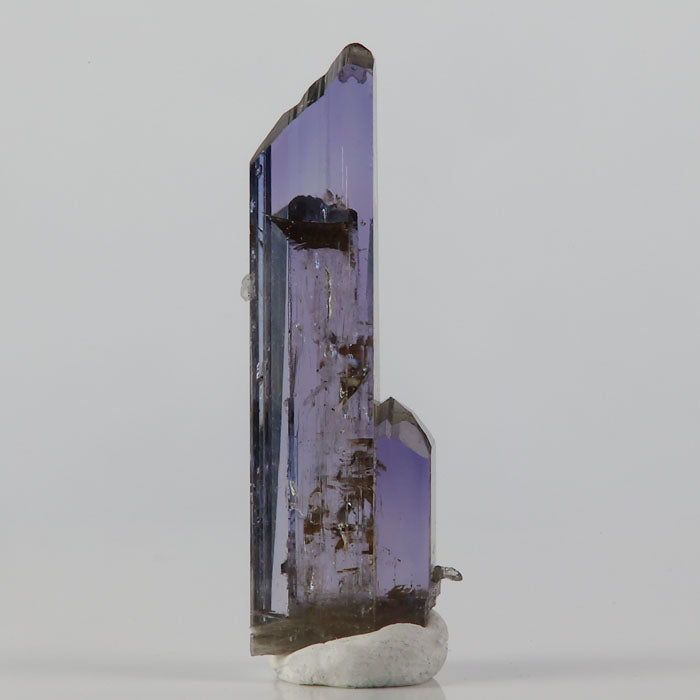 blue violet raw natural tanzanite crystal specimen