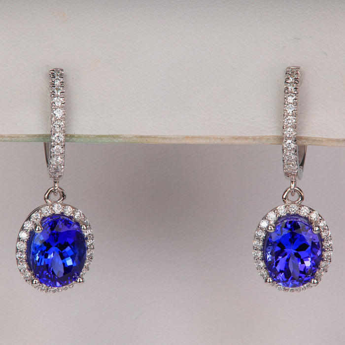 blue violet tanzanite gemstone earrings with diamond in white gold
