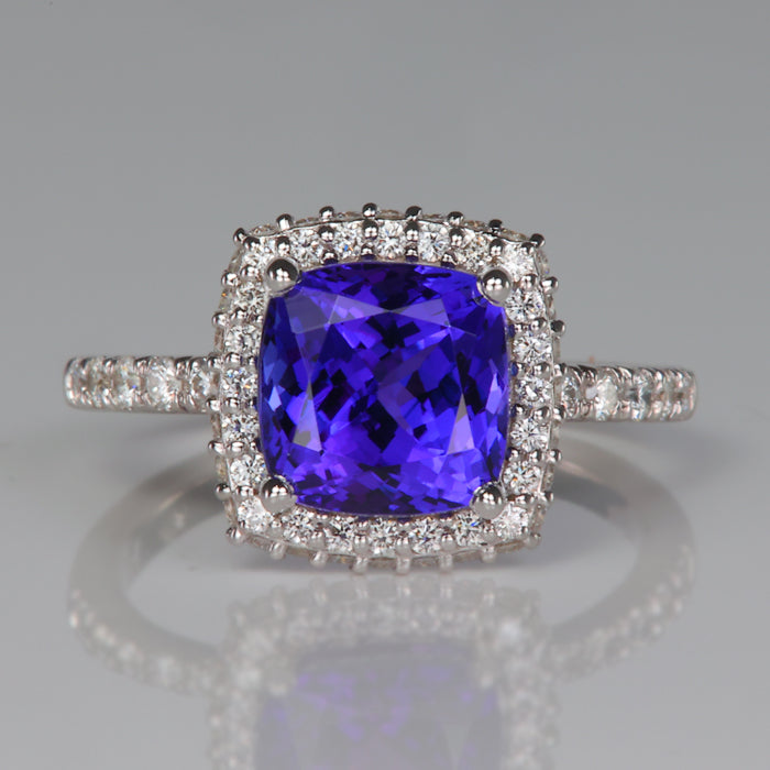 square cushion cut tanzanite and white gold and diamond halo ring