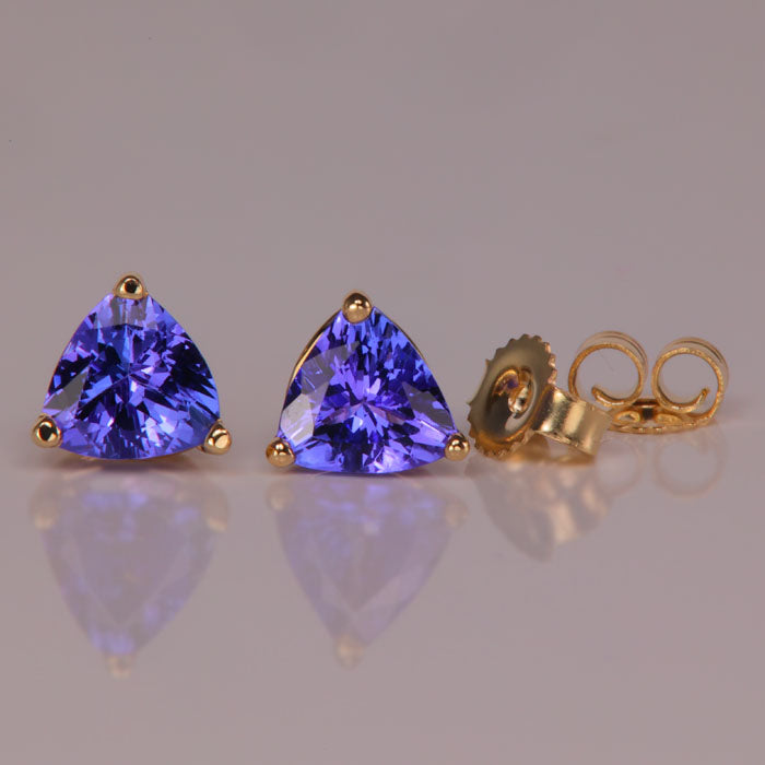 blue violet tanzanite stud earrings trilliant cut