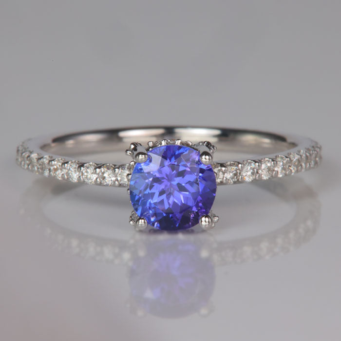 round brilliant tanzanite and diamond ring in white gold