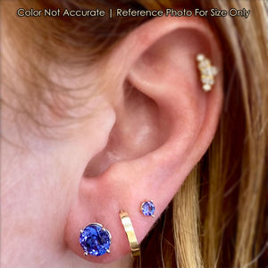 white gold round brilliant tanzanite earring size
