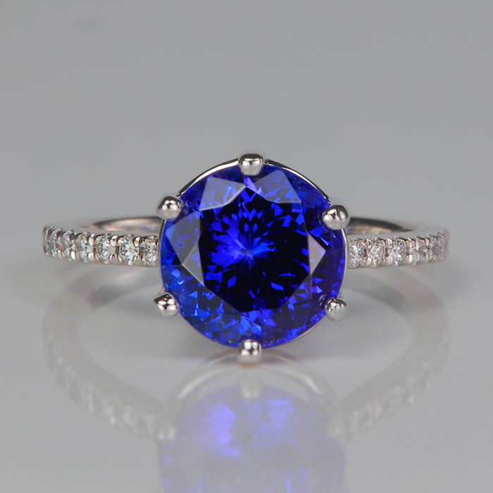 large violet blue tanzanite gemstone ring with diamonds in white gold