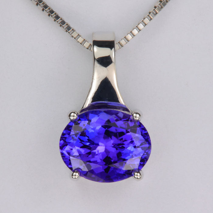 blue violet oval cut tanzanite and white gold pendant