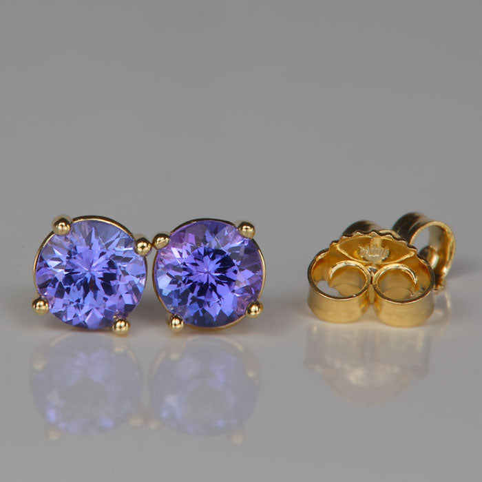 Yellow gold studs with tanzanite gemstones