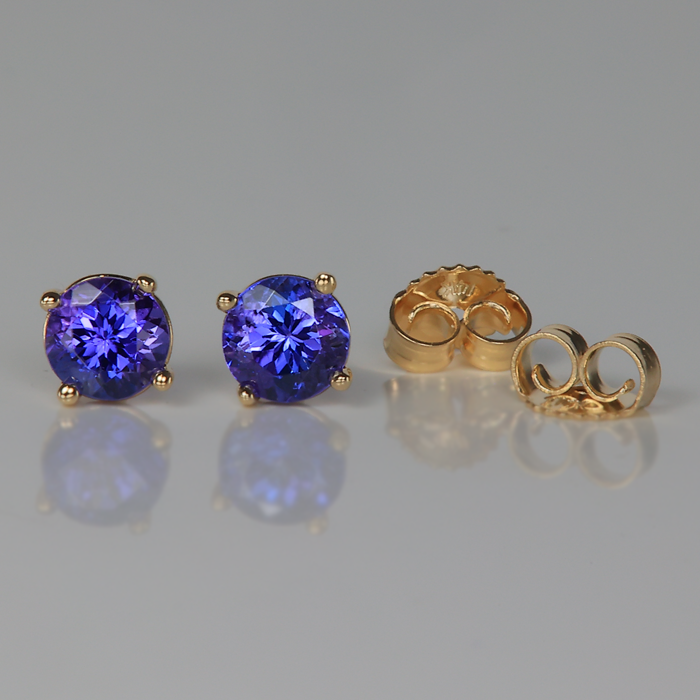 deep color blue violet tanzanite stud earrings in yellow gold