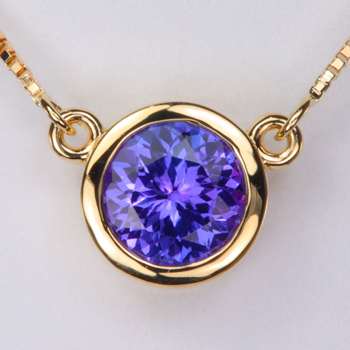 blue violet tanzanite gemstone necklace in yellow gold