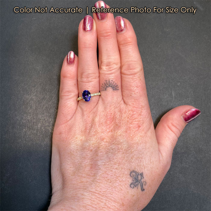 yellow gold oval tanzanite and diamond ring