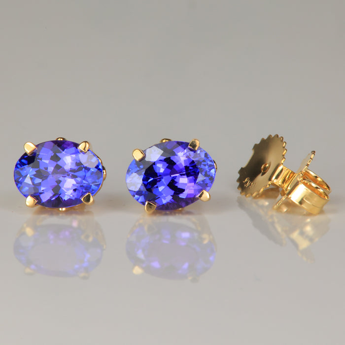 oval cut blue violet tanzanite stud earrings