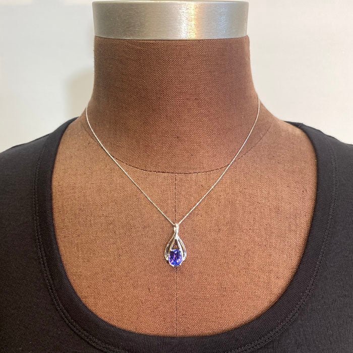 antique cushion tanzanite pendant in white gold