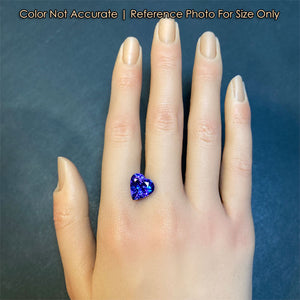 tanzanite heart shaped gem size to a hand