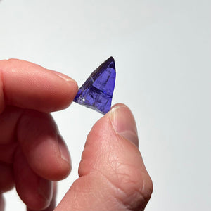 tanzanite raw crystal in hand