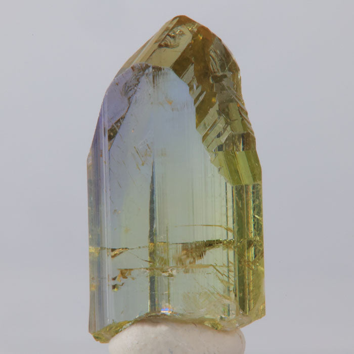 gemmy purple and yellow raw tanzanite crystal