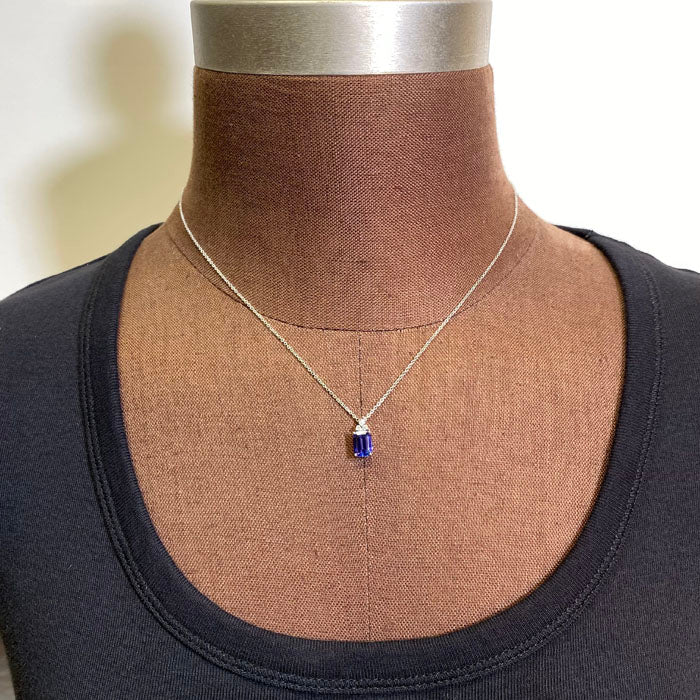 emerald cut tanzanite pendant with diamond white gold