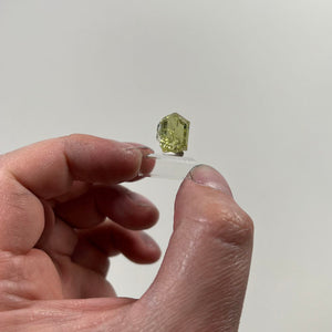 natural tanzanite yellow in hand