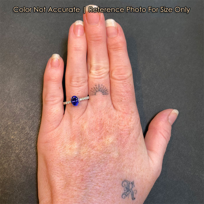 size reference of oval tanzanite ring 