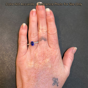 size reference of oval tanzanite ring 