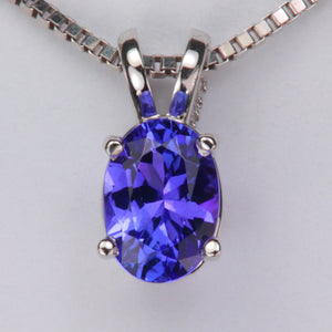 white gold and tanzanite gemstone pendant