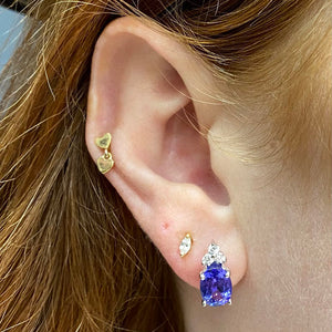 oval cut tanzanite earrings with diamonds in white gold