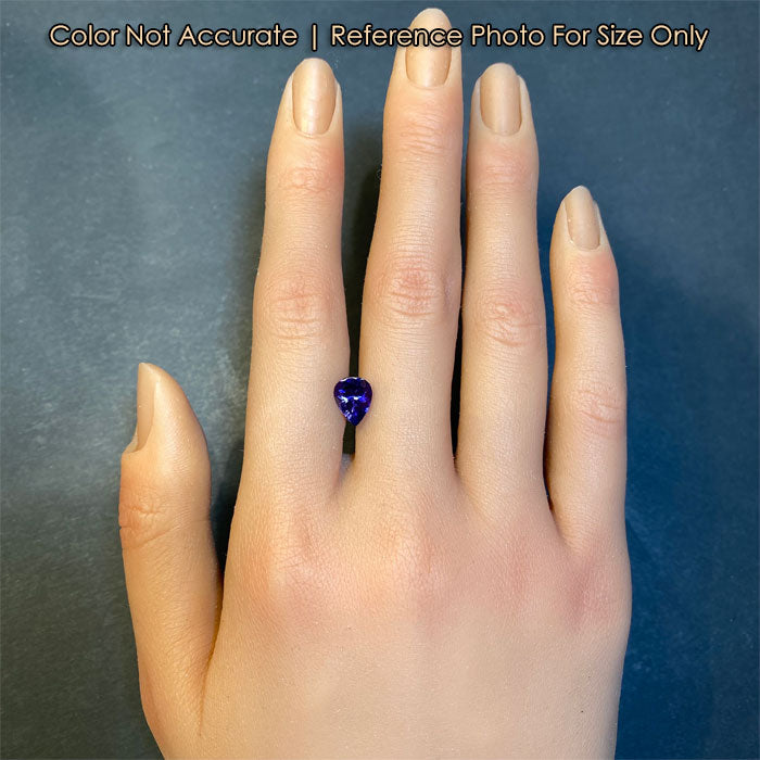  size of pear tanzanite to hand