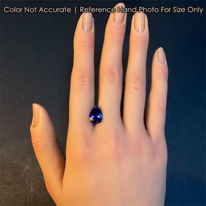 tanzanite pear shape cut on hand