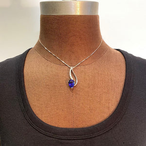 pear shape tanzanite pendant in white gold with diamonds