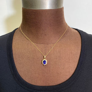 yellow gold diamond oval tanzanite pendant