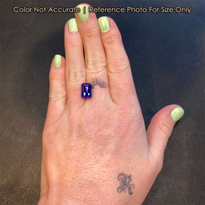 pixel cut tanzanite on hand