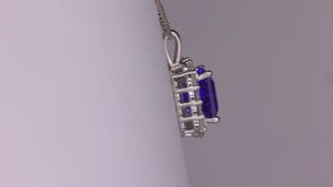 14K White Gold Emerald Cut Tanzanite and Diamond Halo Pendant 4.94cts