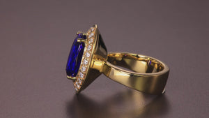 14K Yellow Gold Large Oval Tanzanite and Diamond Halo Ring 7.69 Carats