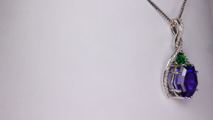 14K White Gold 6.28ct Tanzanite and Emerald Pendant With Diamonds By Christopher Moriarty
