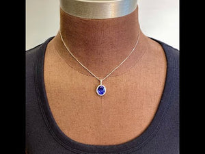 14K White Gold Oval Tanzanite and Diamond Pendant 6.26 Carats