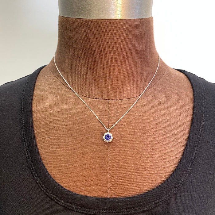 round cut tanzanite pendant with diamonds
