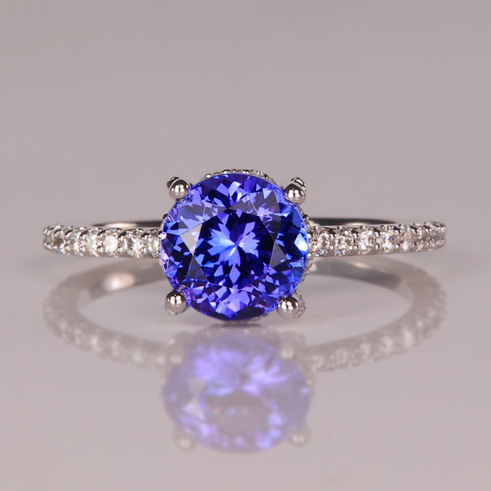 blue violet tanzanite round brilliant cut  gemstone ring with diamonds 