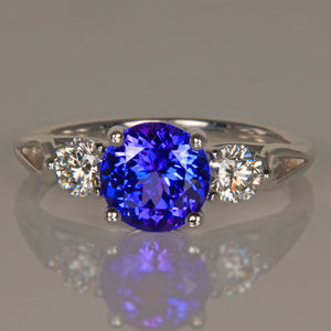 round tanzanite and diamond ring white gold