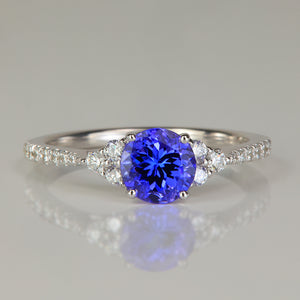 white gold round brilliant cut tanzanite and diamond ring
