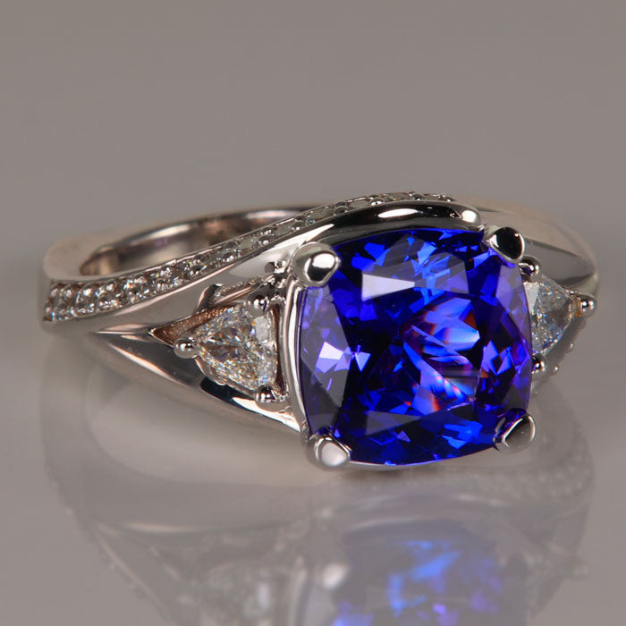 square cushion tanzanite ring with diamonds white gold