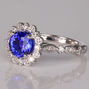 14k white gold round brilliant tanzanite ring with diamonds