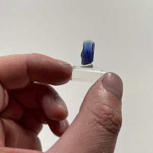raw tanzanite in hand size 