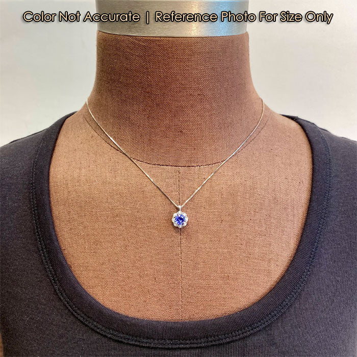 white gold tanzanite and diamond pendant size