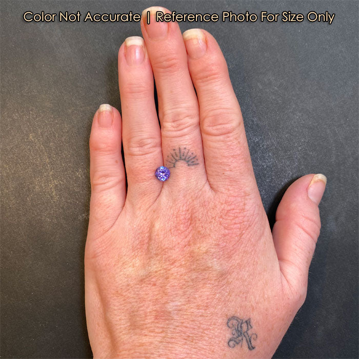 size reference of tanzanite 1.20cts to hand