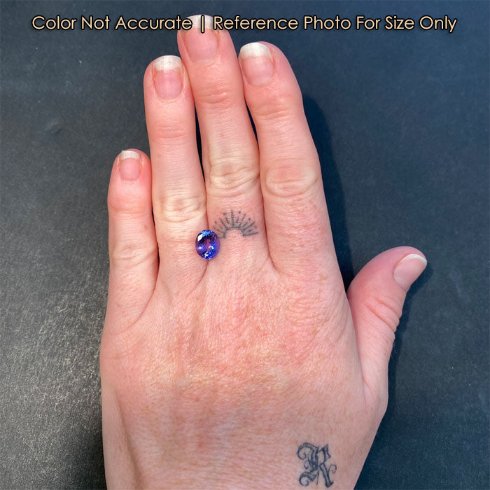 oval cut tanzanite size to a hand